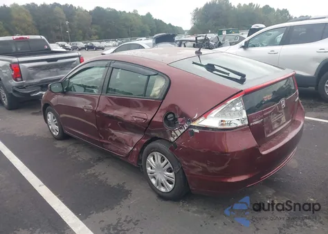 2011 Honda Insight z USA, uszkodzony, nr VIN JHMZE2H38BS011739